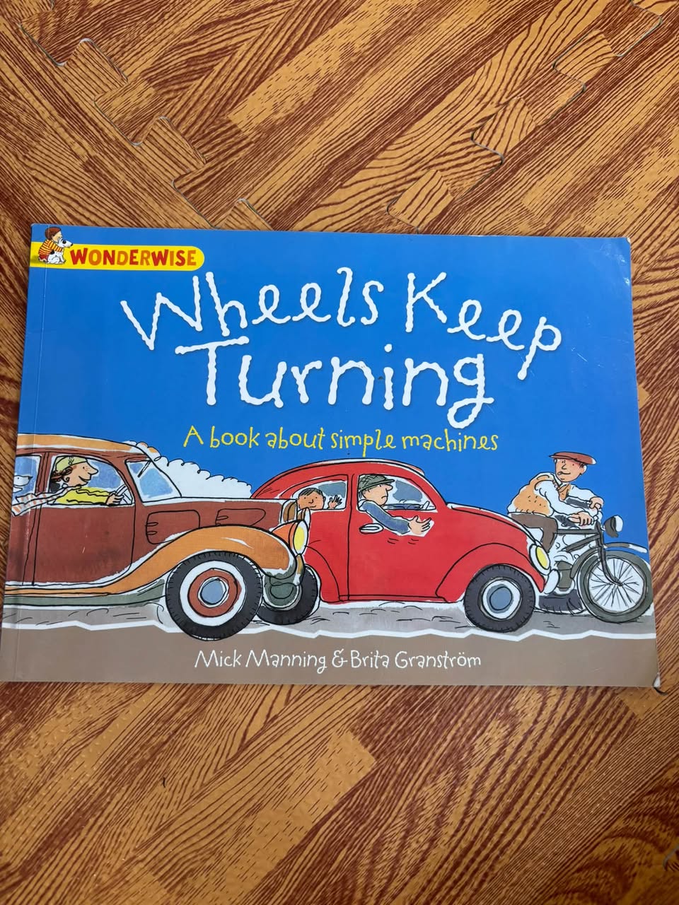 WHEELS KEEP TURNING: A BOOK ABOUT SIMPLE MACHINES (WONDERWISE)